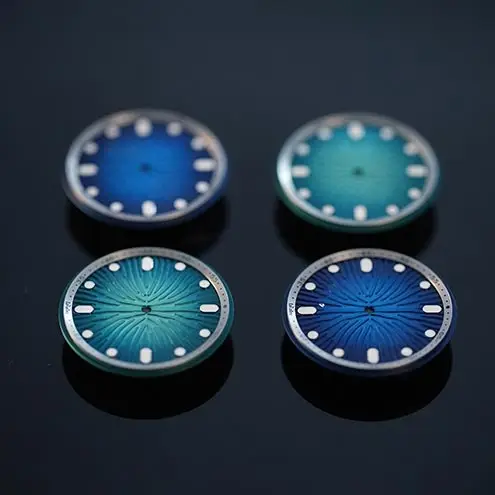 Elegant blue and teal gradient watch dials featuring luminous indexes